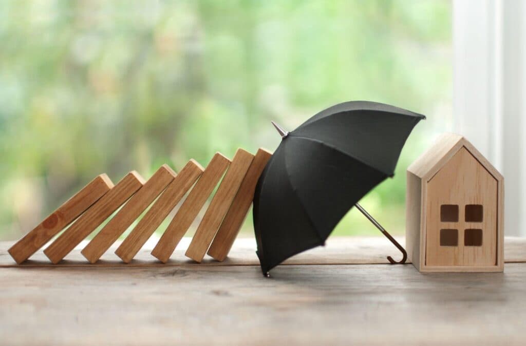 Home insurance policy document with a house icon representing protection for homeowners against property damage