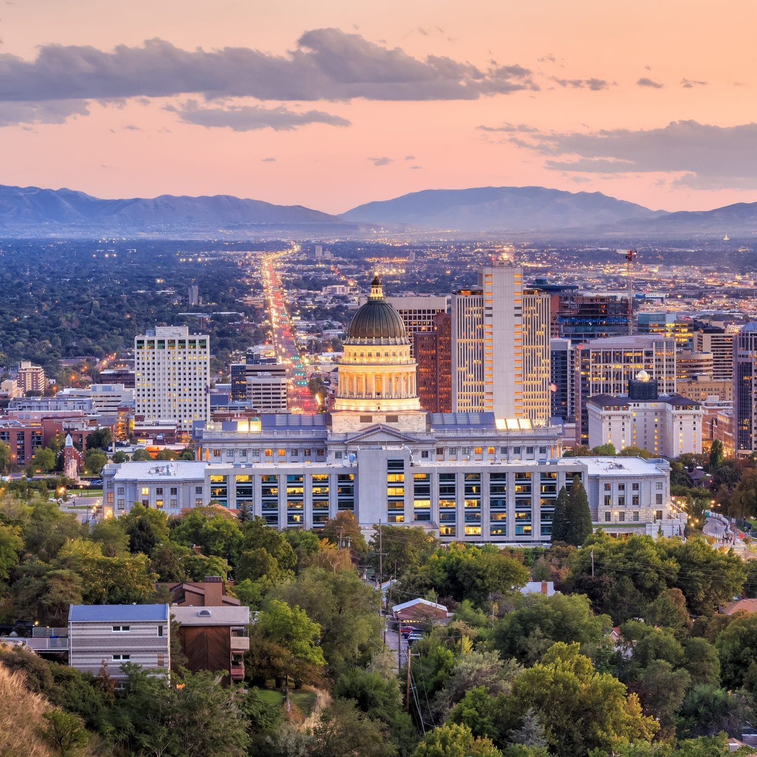 Utah city skyline at sunset with Bear River Mutual in Salt Lake City, Utah