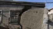 Damaged building from a storm. Have you included earthquake insurance in your policy?